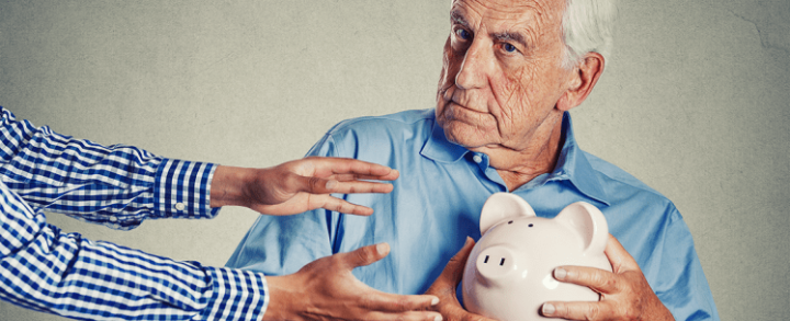 A senior being victim of financial abuse