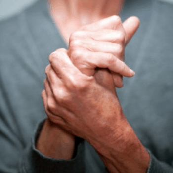 A Parkinson patient restraining hands