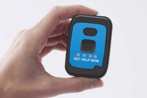 The Mobile GPS button held in a hand with two fingers